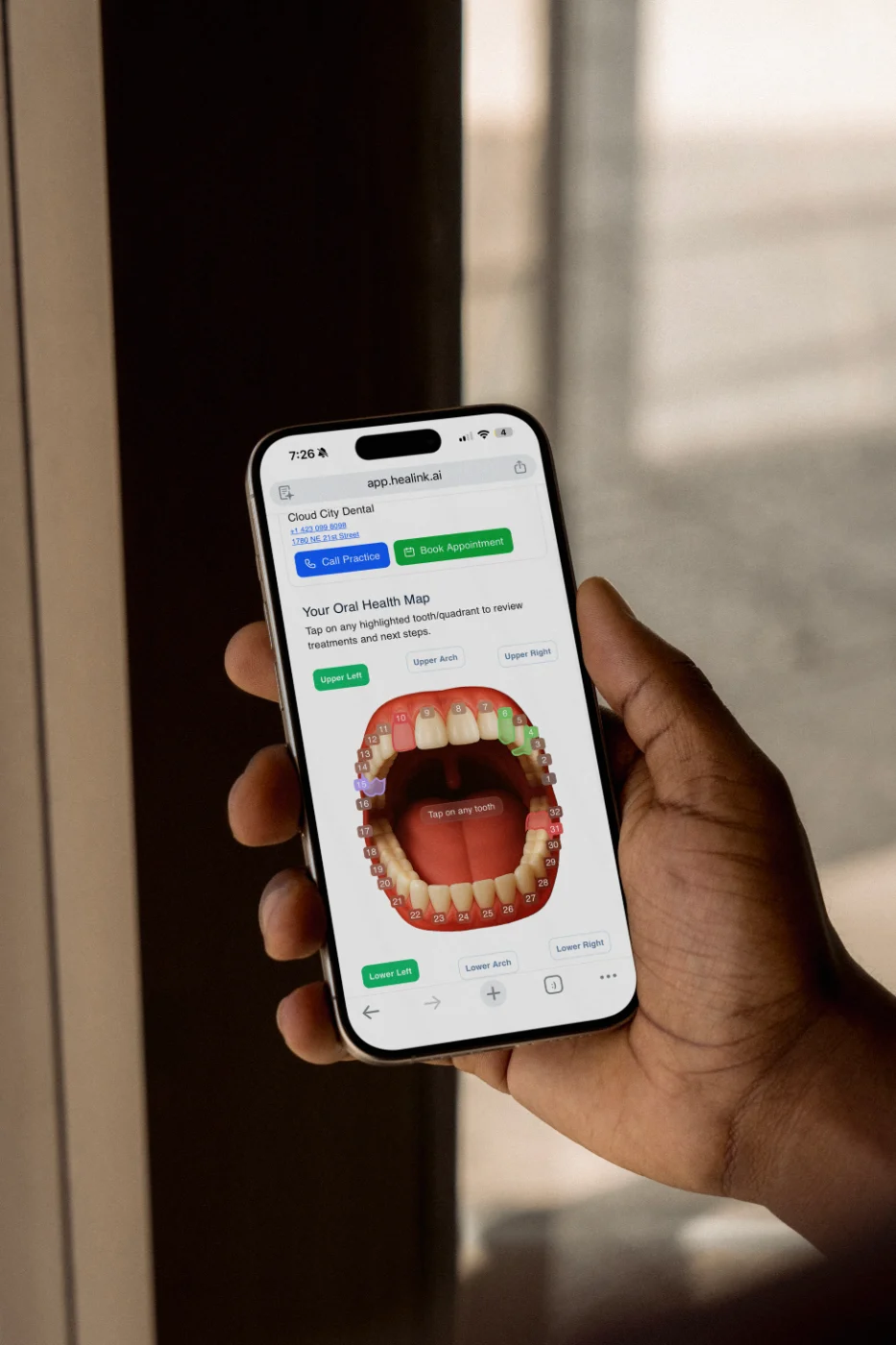Patient reviewing treatment costs on their phone